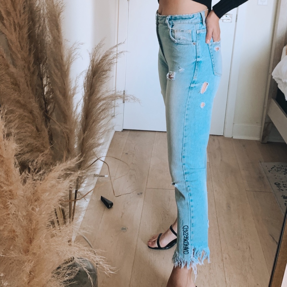High-Waisted Distressed Denim